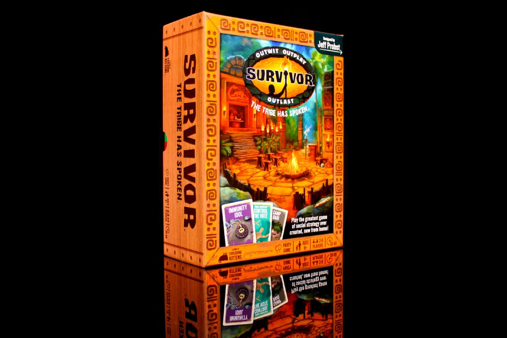 Box cover of the board game 'Survivor: The Tribe Has Spoken', featuring vibrant artwork and the game's title prominently displayed.