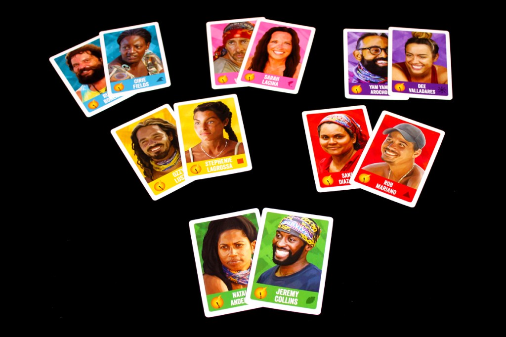 A collection of character cards from the board game Survivor: The Tribe Has Spoken, featuring various players' images and names, arranged on a black background.