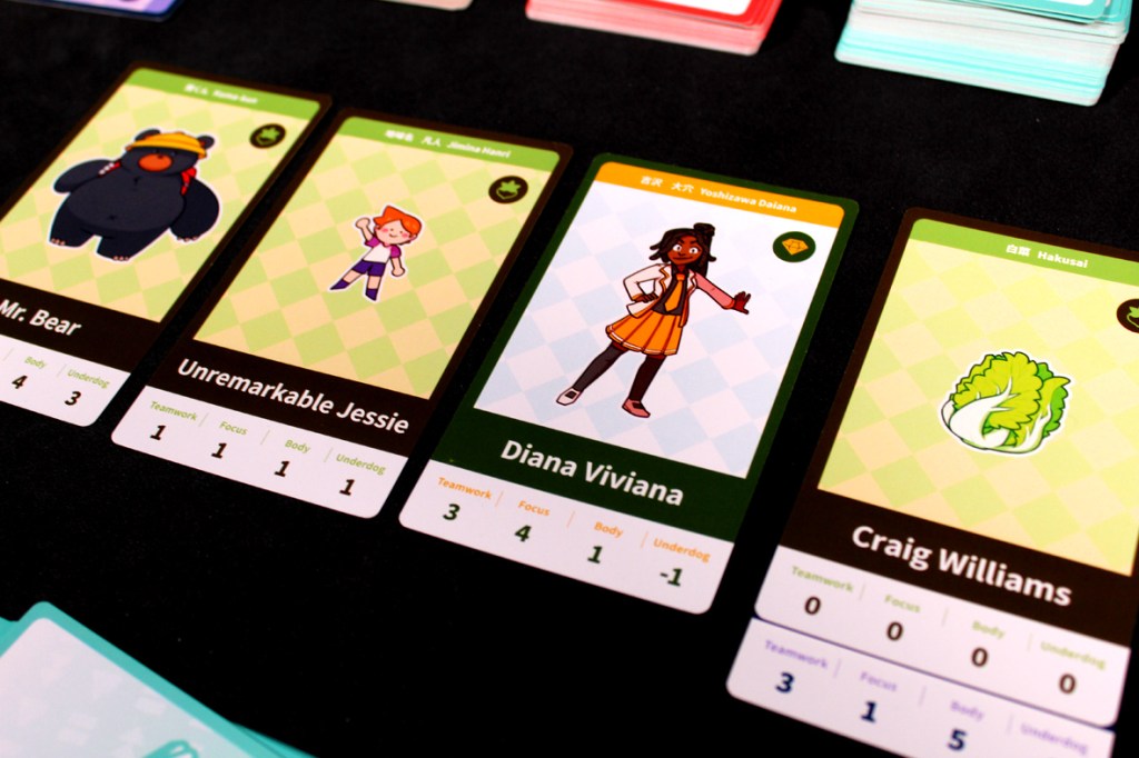 Image of four character cards from the board game Tournament Arc, featuring Mr. Bear, Unremarkable Jessie, Diana Viviana, and Craig Williams, each with attributes displayed below their illustrations.