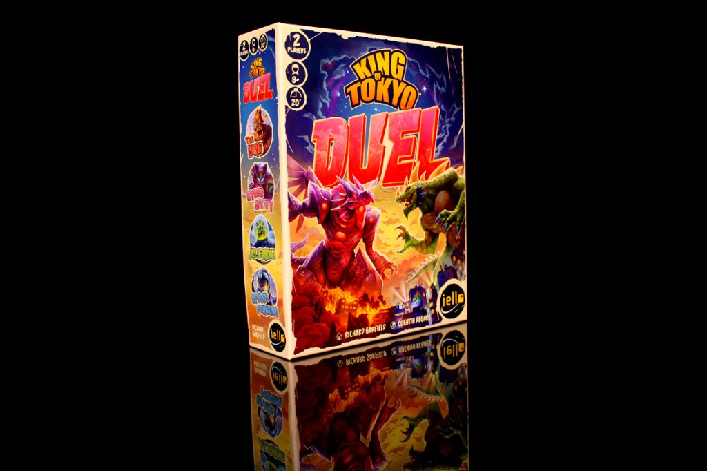Box cover of the board game 'King of Tokyo: Duel' featuring colorful artwork of monsters and the game's title.
