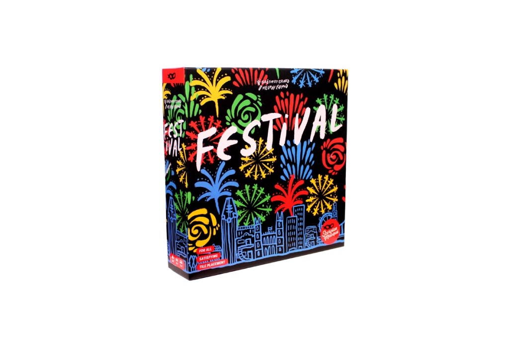 Colorful board game box of 'Festival' featuring fireworks and city skyline illustrations.