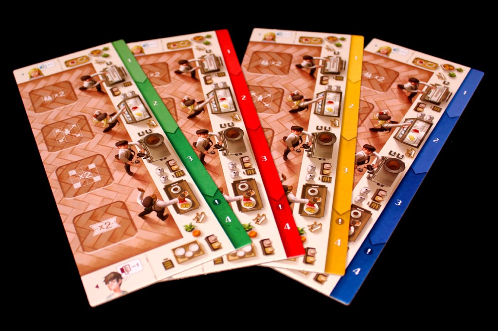 Four player boards in different colors (green, red, yellow, blue) with illustrations of characters working in a coffee shop, displaying various ingredients and upgrade options.