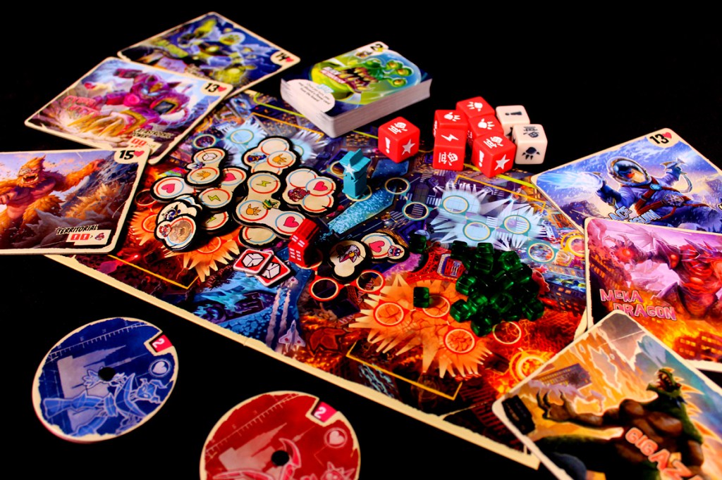 A tabletop game setup of King of Tokyo: Duel featuring colorful monster cards, dice, and game tokens on a vibrant game board.