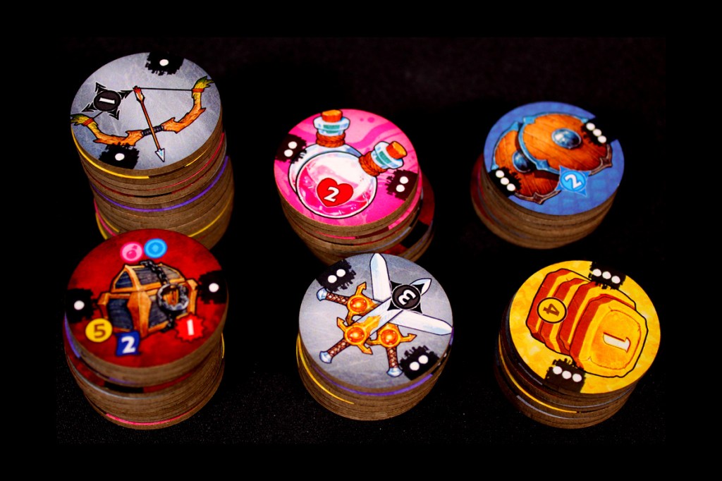 A collection of game tokens featuring various designs, including weapons, potions, and treasure chests, stacked on a dark background.