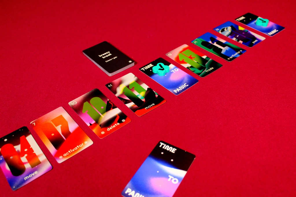 A layout of colorful game cards from the board game 'Time to Panic' on a red surface, showcasing various card actions such as 'move', 'delete', and 'activator'.