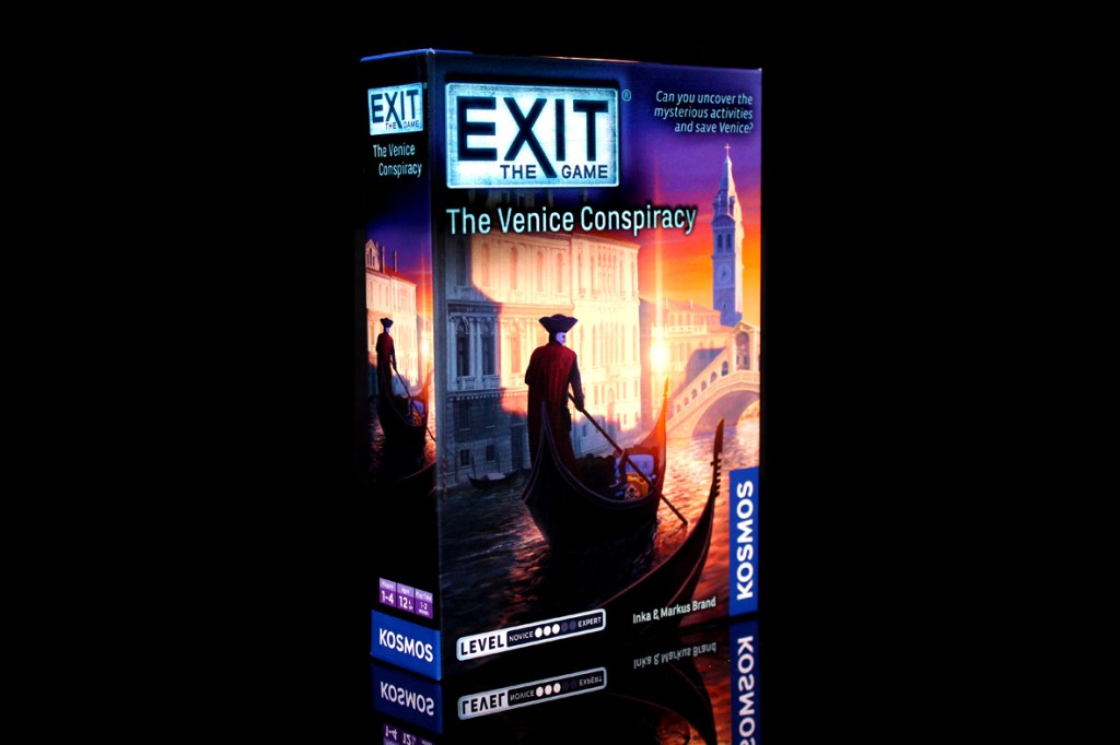 A close-up of the game box for 'EXIT: The Venice Conspiracy' featuring a graphic of a gondola and Venetian architecture, highlighting the title and publisher KOSMOS.