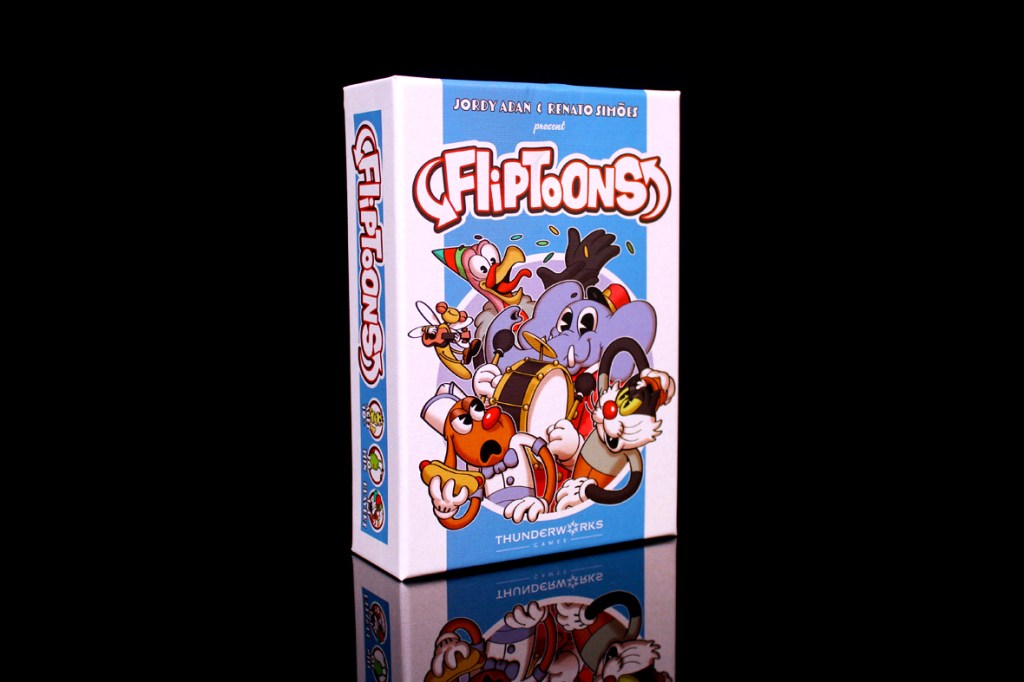A colorful box for the board game 'FlipToons' featuring playful cartoon characters, including a drum-playing elephant and other whimsical animals, set against a light blue background.