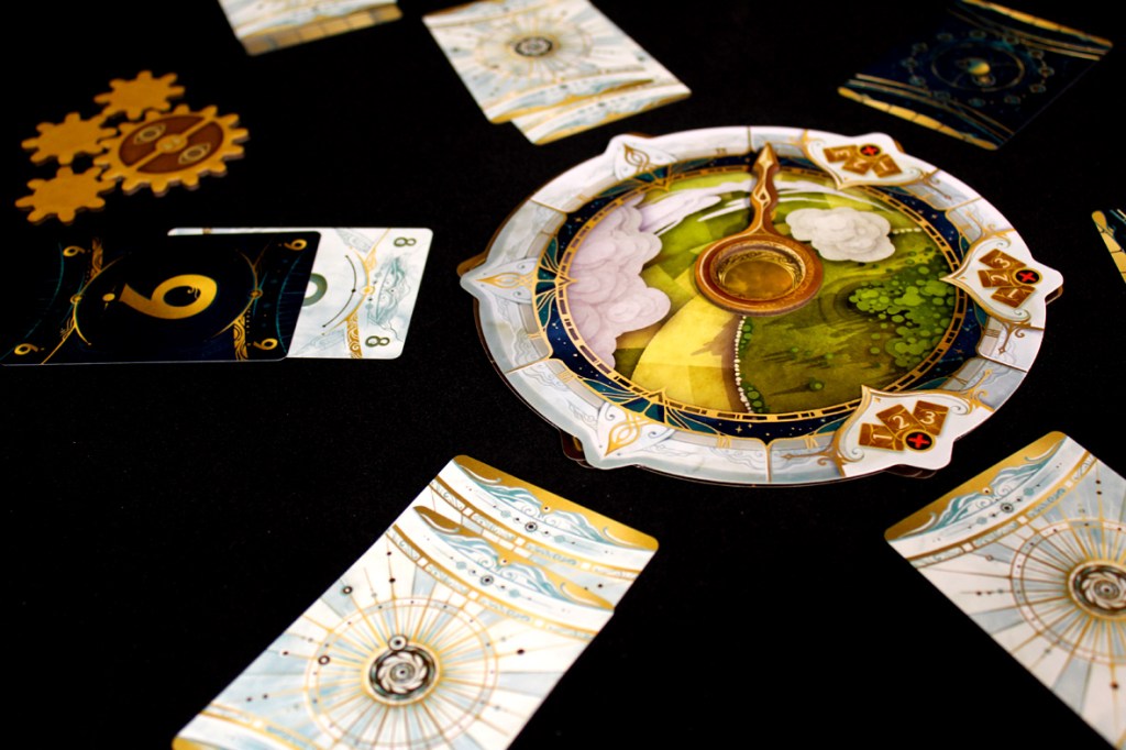 Close-up of the game 'Take Time' board with a circular clock-like design in the center and various cards arranged around it.