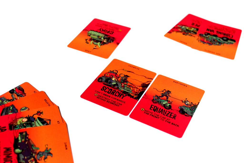 Colorful cards from the game Dustbiters: Pocket Edition displaying various abilities and artwork.