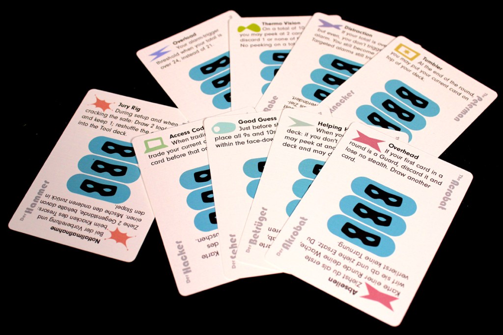 A collection of game cards featuring various instructions and actions associated with a game, including titles and descriptions like 'Jury Rig' and 'Overhead'.