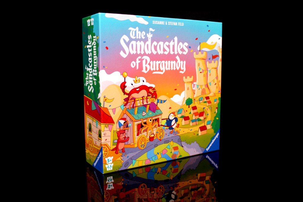 A colorful board game box for 'The Sandcastles of Burgundy', featuring whimsical illustrations of castles, characters, and a vibrant landscape.