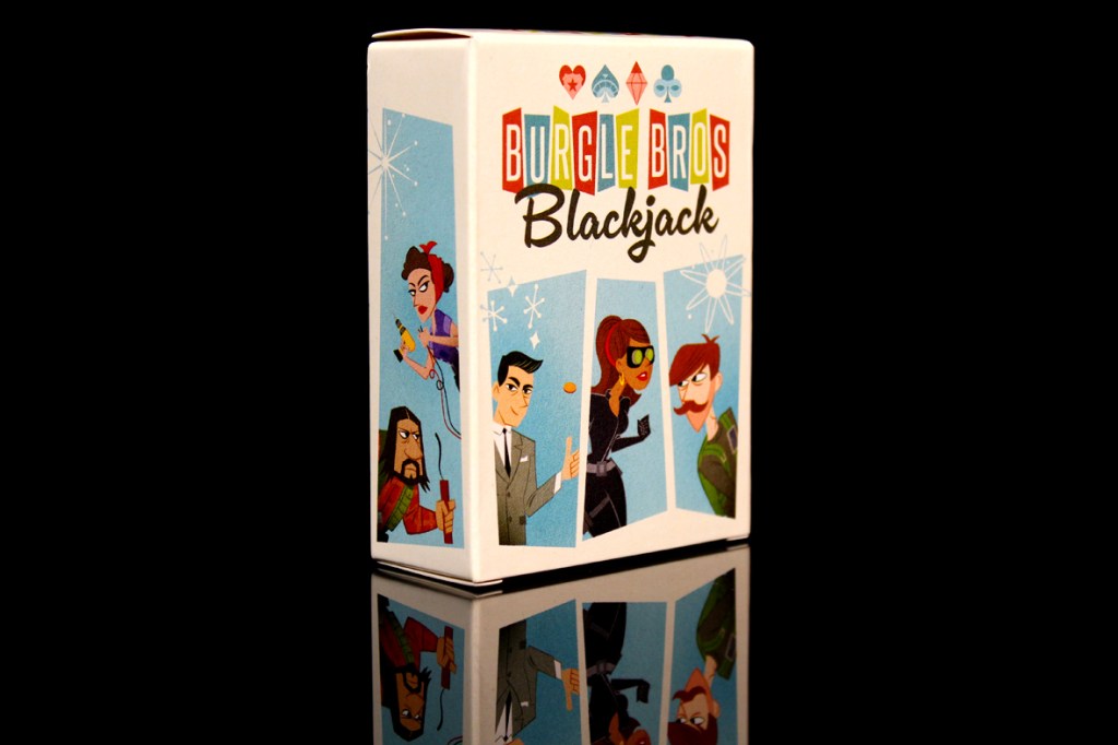A colorful box for the card game 'Burgle Bros: Blackjack' featuring cartoon characters on the front, including a woman with a gun, a man in a suit, and others in various poses.