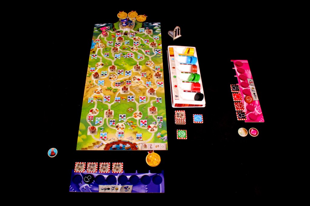 A colorful board game setup featuring a game board with paths and various symbols, player pieces, resource tokens, and dice on a black background.
