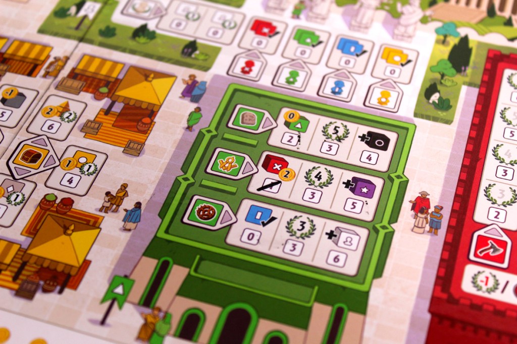 A close-up view of a board game layout featuring various icons, resources, and player actions, with colorful illustrations of market stalls and characters in a medieval setting.
