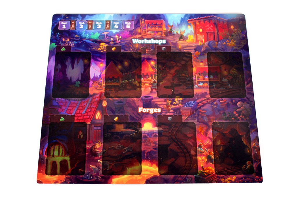 A colorful game board featuring sections labeled 'Workshops' and 'Forges', with empty slots indicating areas for game pieces. The background depicts a whimsical village landscape.