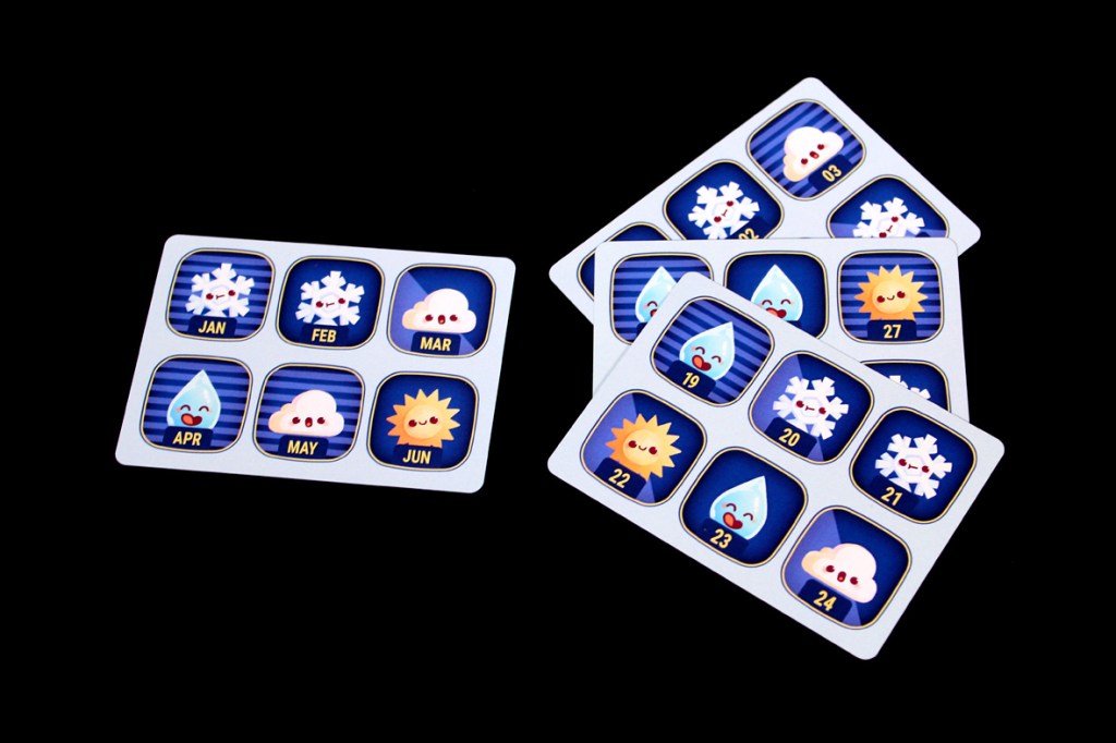 Colorful weather-themed cards displaying icons for each month of the year accompanied by weather symbols like snowflakes, raindrops, and sunshine.